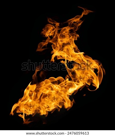 Fire and burning flame of explosive fireball isolated on dark background for abstract graphic design