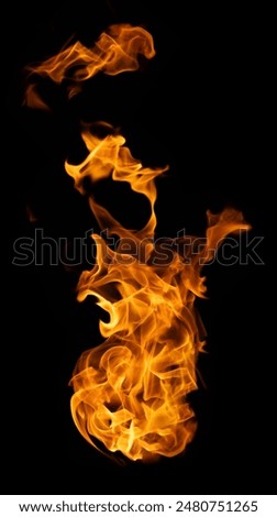 Fire and burning flame of explosive fireball isolated on dark background for abstract graphic design usage