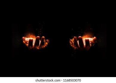 The fire was burning at the hands of both 2 side on a black background.