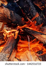 a fire is burning with logs