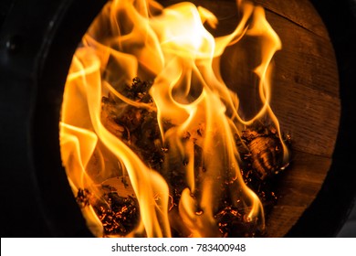 Fire Burning In A Wooden Barrel