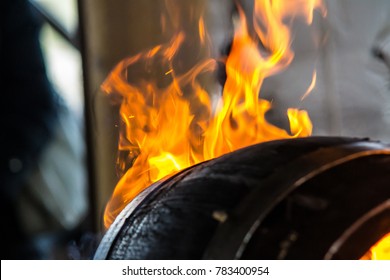 Fire Burning In A Wooden Barrel