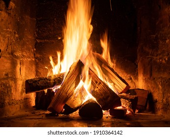 A fire burns in a fireplace, Fire to keep warm. Winter time