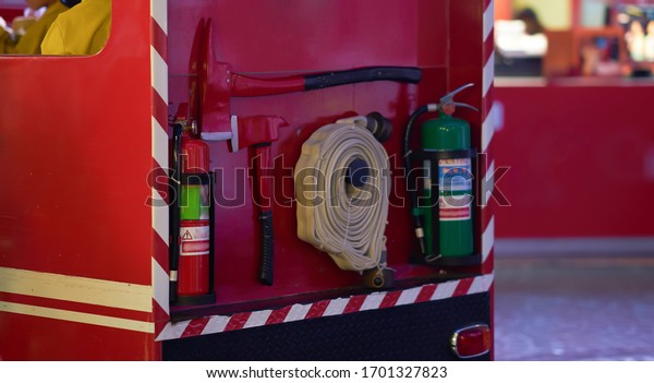 fire cease\
tools on back of fire engines\
truck