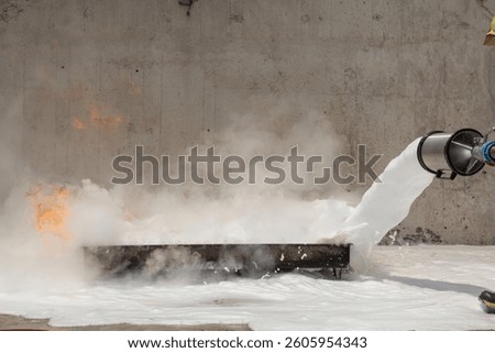 Fire container and fire-fighting foam to put it out