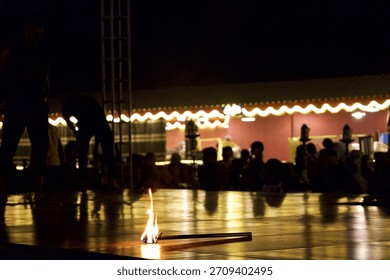 Fire dance with burning fire torch 