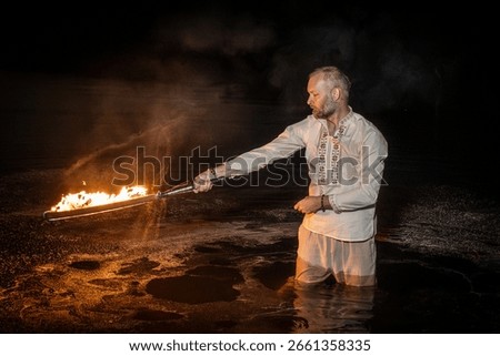 fire dance, fiery sword, fire, elements, water, fire show, night, glow, lycopodium sword, Vikings, burning torches, flares, firelight, elementals, natural elements