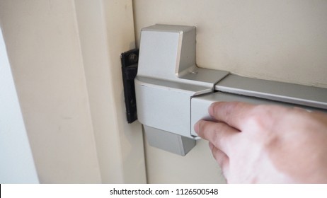 Hand Pushing Fire Door Handle Fire Stock Photo (Edit Now) 1261793701