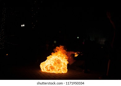 Fire Eater blowing a ground fire. - Powered by Shutterstock