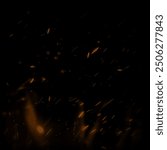 Fire embers particles over black background. Royalty high-quality free stock image of Burning hot sparks effect with embers burning ash and smoke flying in the air. Abstract dark glitter fire lights