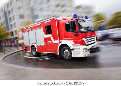 Fire engine driving fast on a road in an emergency