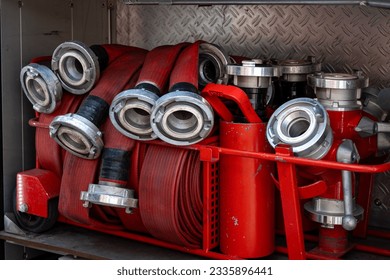 Fire engine equipment from the inside - fire hose hoses ready for use close uo