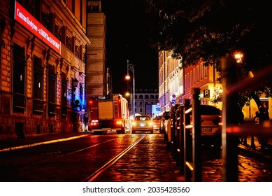 Fire Engine With Flashing Lights In Night City Street. Wroclaw, Poland - August 14, 2021