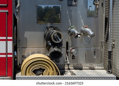 Fire engine hose hookup water or foam discharge valves - Shutterstock ID 2163697323
