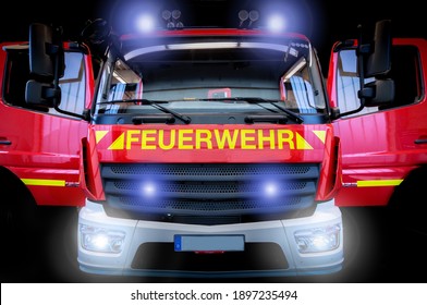 Fire Engine LF10 With Flashing Lights And Front Flashers Against A Black Background. Translation: 