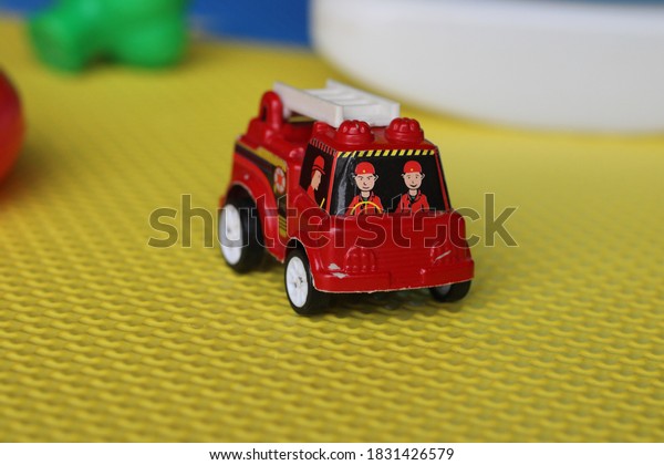 Fire engine\
miniature toy to help kids\
learn