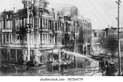 Fire Engine Spraying Water On Burned Buildings In San Francisco After The 1906 Earthquake