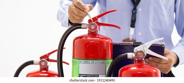 Fire Engineering Checking Pressure Gauge Level Of Fire Extinguishers Tank In The Building Concepts Of Protection And Prevent For Emergency And Safety Rescue And Fire Training.