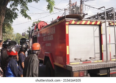 fire engines are on standby and trying to extinguish the fire at the furniture warehouse fire site. : Yogyakarta, Indonesia - 12 May 2022