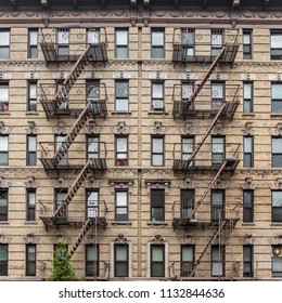 A Fire Escape Of An Apartment Building In New York City.