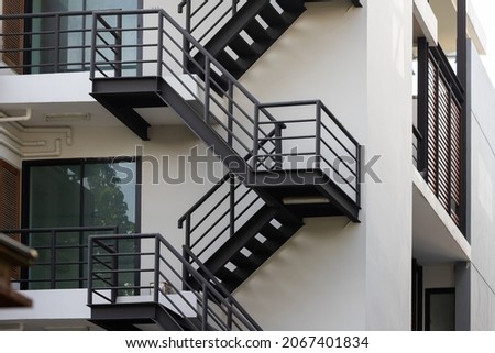 fire escape stair steel. black outdoor metal stair of building.