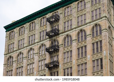 Fire Escape Stairs Outside Of A Tall Building In New York City, New York.