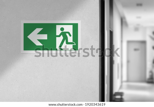 Fire exit sign\
in the corridor of the\
building