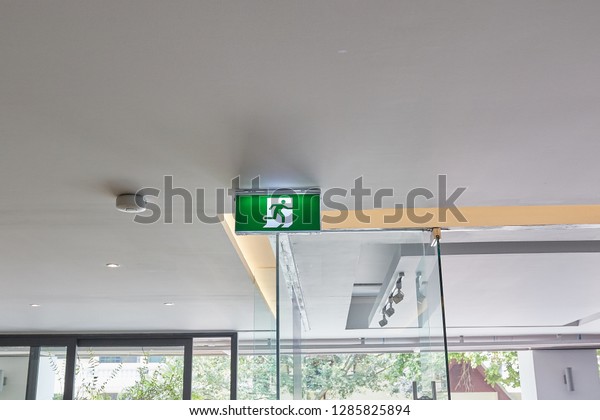 Fire Exit Sign Hanging Overhead On Stock Photo Edit Now 1285825894