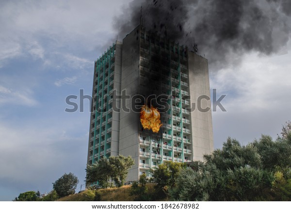Fire - explosion in the hotel room.
Images captured from the outside. Building on
fire.