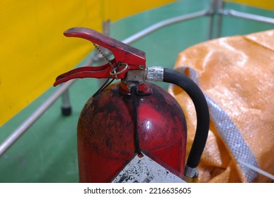 Fire Extinguisher Covered In Black Ash