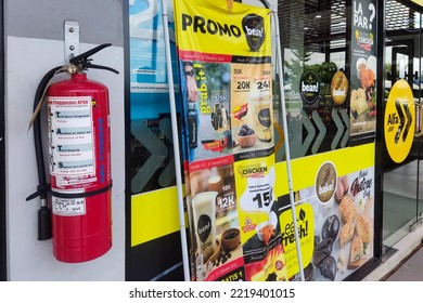 Fire Extinguisher On The Wall Of A Convenience Store. Kendal, Central Java, Indonesia 27 October 2022.