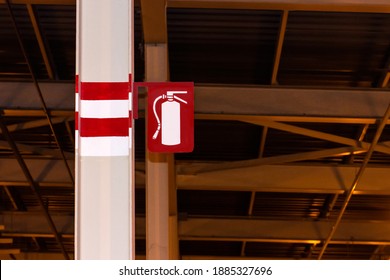Fire extinguisher sign attached to the post,on steel beam in industry
