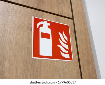 Fire extinguisher sign on a wall