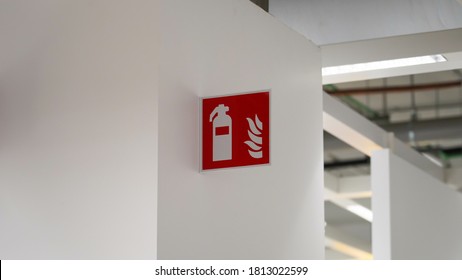 Fire Extinguisher Station Sign On White Wall