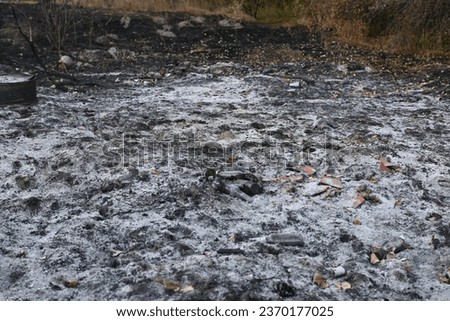 Fire fields, scorched earth, the aftermath of a meadow fire