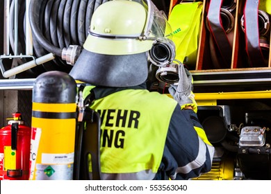 Fire Fighter With Breathing Protection And Oxygen Tank