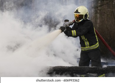 Fire fighter at work on fire
