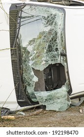 Fire Fighters And Police At A Single Vehicle Accident That Rolled And Hit A Power Pole And Trees Resulting In Minor Injuries To The Driver.