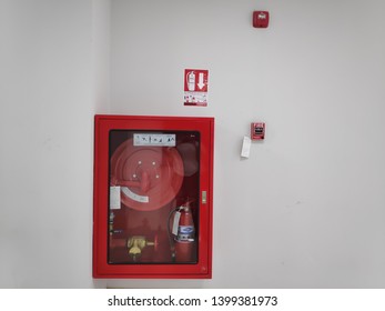 Fire Hose Cabinet Extinguisher Hanging On Stock Photo (Edit Now) 1332332867