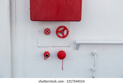 Fire fighting equipment, water hose, connections and valves for water ready for use at the bulkhead or wall on board a vessel