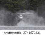 Fire fighting helicopter hovering over water
