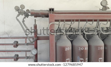 Fire fighting system red pipe have manual valves and pressure gauge to storage tank in factory