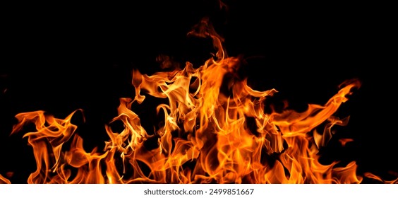 Fire flame background. Hell bonfire. Texture of fire on a black background. Abstract fire flame background. Large burning fire. - Powered by Shutterstock