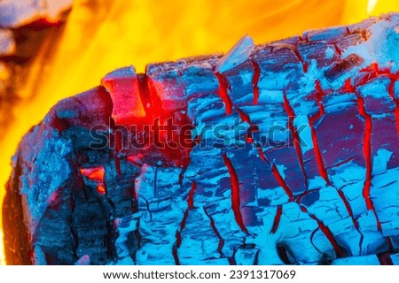 Fire flame Creates a warm and cozy atmosphere Provides warmth in cold weather Used for cooking and grilling outdoors Can be hazardous if mishandled