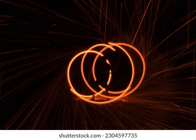 Fire and Flame performance,Fire dancers Swing fire dancing show fire show on the beach dance man juggling with fire.