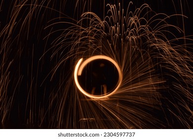 Fire and Flame performance,Fire dancers Swing fire dancing show fire show on the beach dance man juggling with fire.