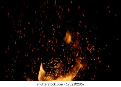 fire flame with sparks on black background - Shutterstock ID 1932102869