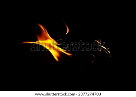 Fire flame texture. Burning material backdrop. Burn effect pattern. Blaze and torch wallpaper. Heat and haze backdrop. Exploison and hot background.