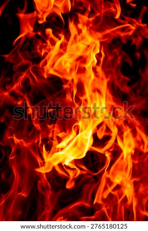 Fire flame texture. Fire sparks. Fire background. Fire glowing effect.