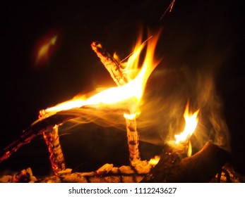 Fire flames in the night at beach - Shutterstock ID 1112243627